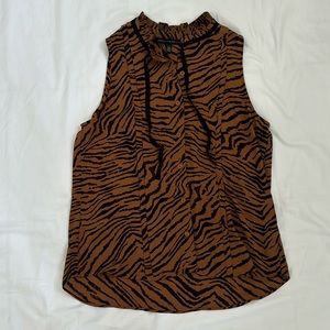 White House Black Market Sleeveless animal print top with tie detail. Size S.
